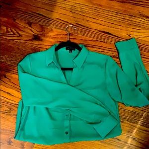 The limited blouse. 100% polyester. Excellent cond